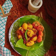 A picture of Aloo Dum(Bengali-Style Spicy Potato Curry)গরম মশলায় আলুর দম | A Bengali-Style Spicy Potato Curry.