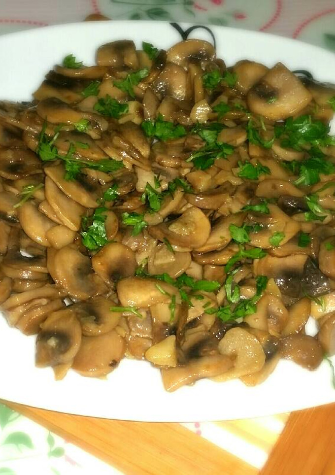 Una foto de Champiñones al ajillo con coñak