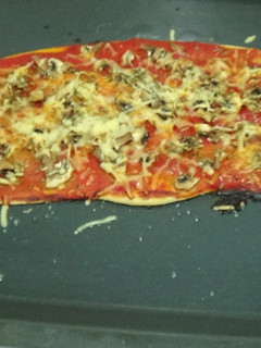 Una foto de Pizza de champiñones