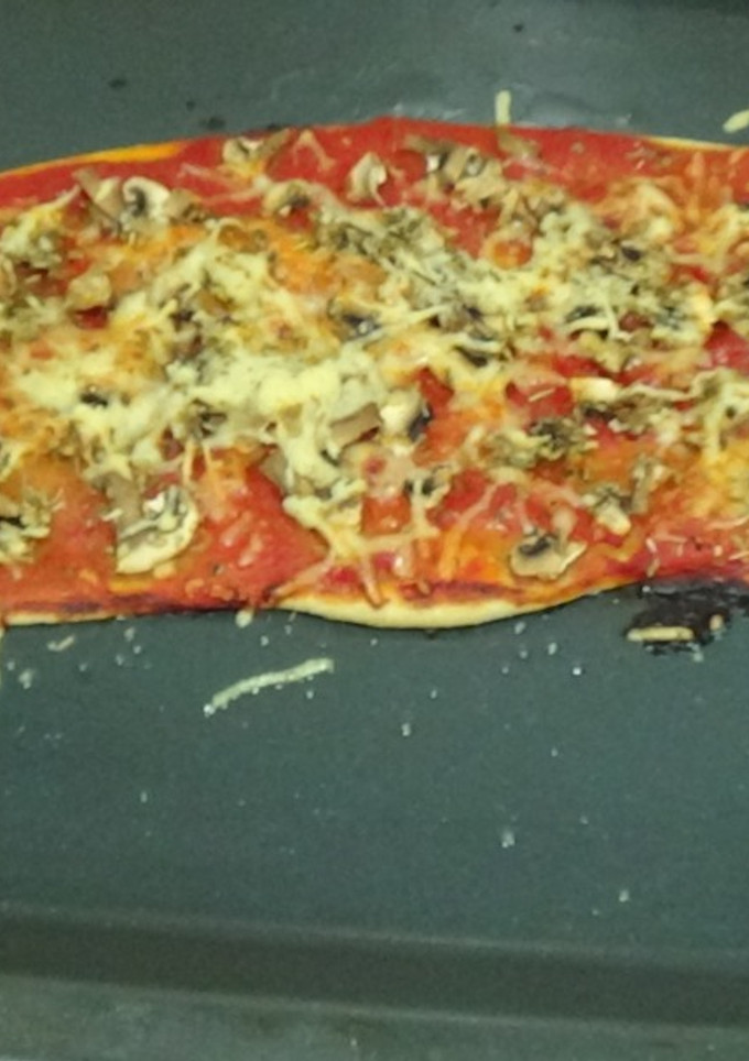 Una foto de Pizza de champiñones