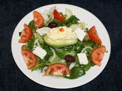 A picture of boiled egg with cucumber