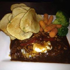 A picture of Portuguese Steak/hand cut fries/steamed veggies.