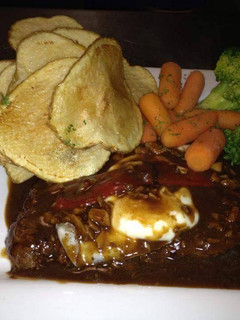 A picture of Portuguese Steak/hand cut fries/steamed veggies.