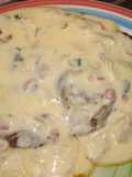 Entrecot con salsa champi y puré de papas