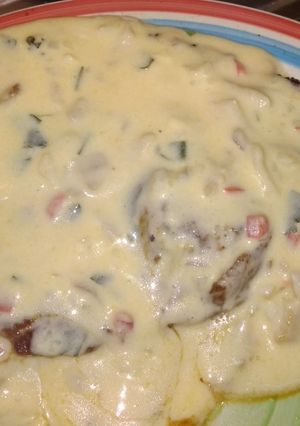 Una foto de Entrecot con salsa champi y puré de papas