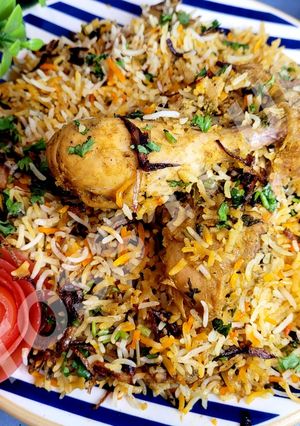 A picture of Authentic Hyderabadi Kachchi Yakhni Chicken Dum Biryani.