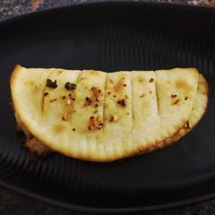 A picture of Stuff cheese garlicbread.
