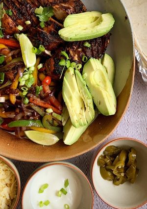 A picture of Blackened chicken fajitas.
