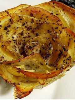 Una foto de Patatas enrosadas