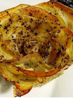 Una foto de Patatas enrosadas