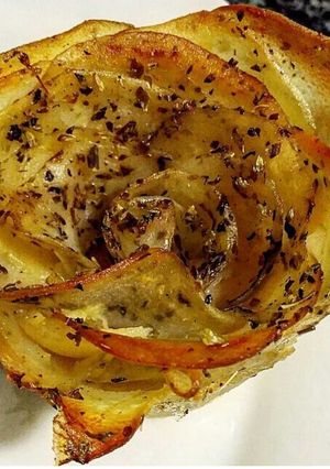 Una foto de Patatas enrosadas