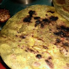Palak ki roti stuffed with aloo and tamatar A picture of Palak ki roti stuffed with aloo and tamatar.