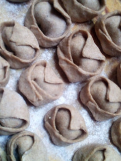 Una foto de Tortelettis de masa integral relleno de espinaca y ricota