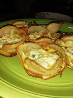 Una foto de Canastitas de papa con queso y huevo