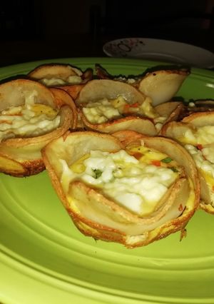 Una foto de Canastitas de papa con queso y huevo