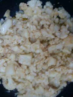 Una foto de Coliflor cocida con Ajo laminado