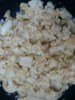 Una foto de Coliflor cocida con Ajo laminado