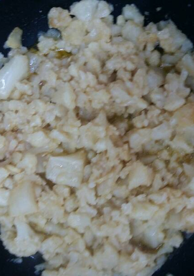 Una foto de Coliflor cocida con Ajo laminado