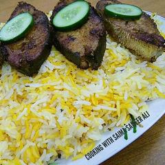 A picture of Fried fish with garlic fried rice #cookpadapp.
