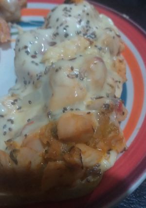 Una foto de Zucchini relleno con pollo