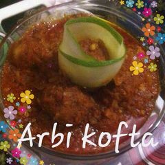 A picture of Special Arbi kofta with gravy.