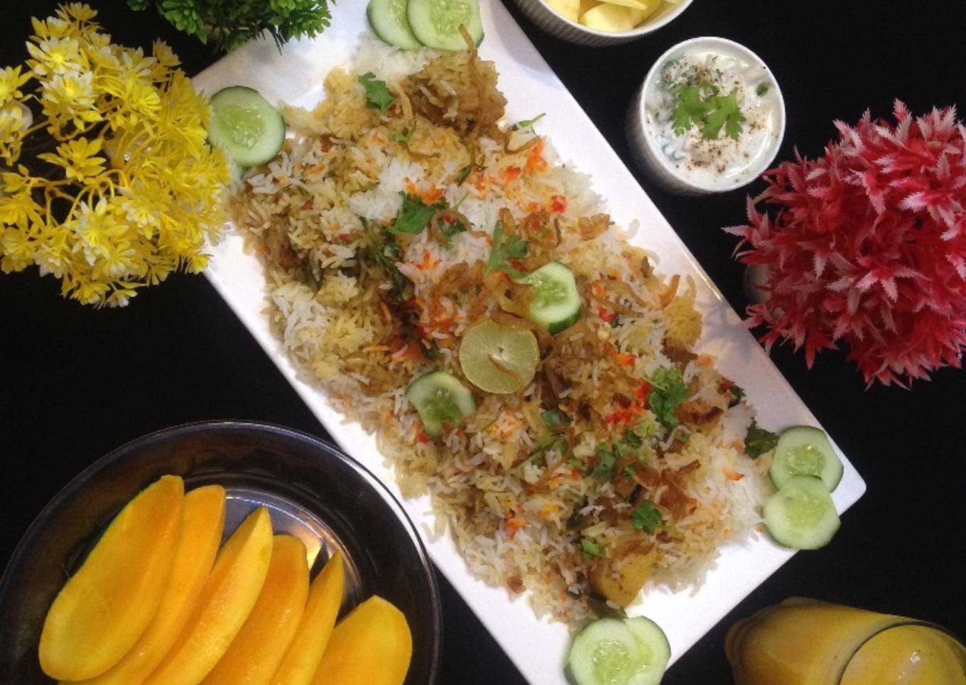 ChatpatiBombay biryani with tang twist, yogurt salad, mango, apple cubes