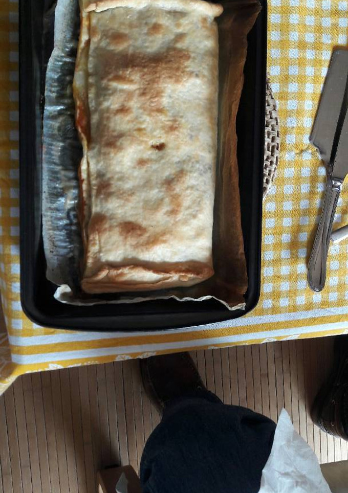 Una foto de Empanada de bacalao con pimientos