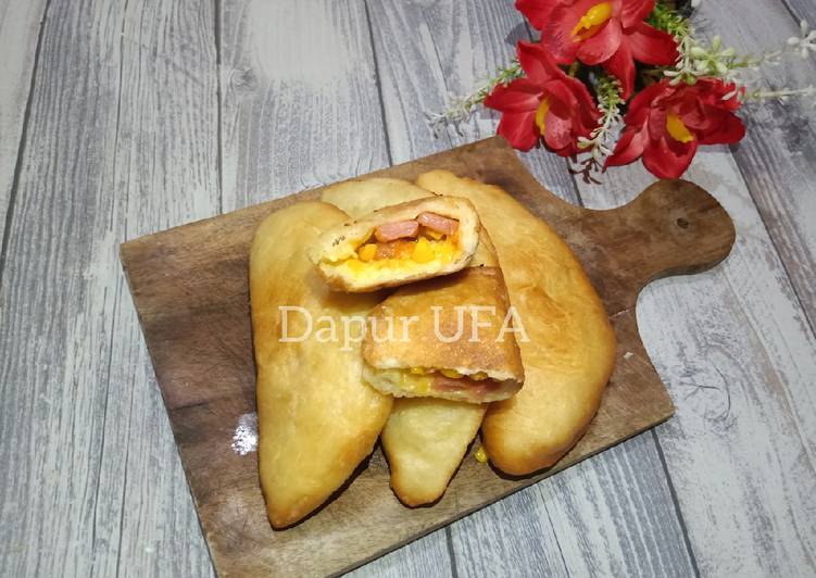 Bagaimana Menyiapkan Pizza goreng yang Enak Banget