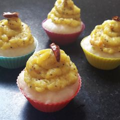 A picture of Rava idli cup cake with masala aloo frosting.