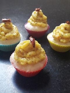 A picture of Rava idli cup cake with masala aloo frosting.