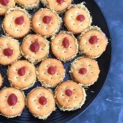 A picture of Monaco biscuits stuffed sev puri.