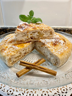 Una foto de Tarta de manzana y crema ricotta