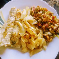 Chips and egg sauce A picture of Chips and egg sauce.