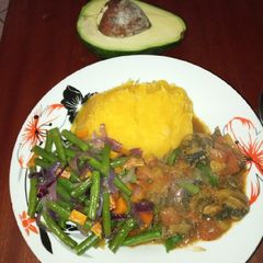 A picture of Matumbo in coconut cream and mashed pumpkin.