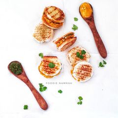 A picture of Vada Pav bread coins.