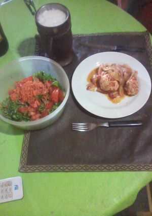 Una foto de Pollo encebollado