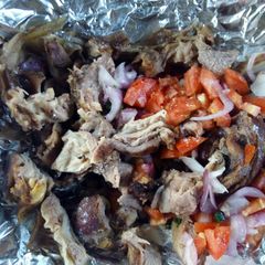 A picture of Nyama Choma with Kachumbari.
