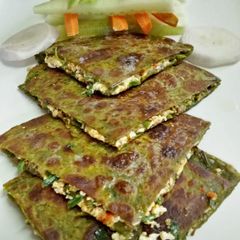 A picture of Palak paneer paratha.