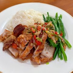A picture of Crispy Pork Belly with Sambal Matah & Green Beans.
