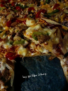صورة لوصفة پيتزا السائلة بالتونة