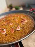 Arroz con sepia, atún y gambitas