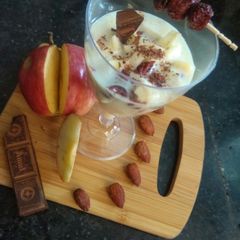 A picture of Fruit And Dry Fruits Custard.