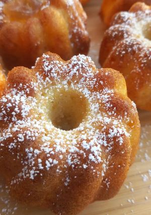 A picture of Orange Mini Cakes (Made in a 12-cavity mini bundt pan).