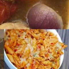 A picture of Cheesy tomato pasta.