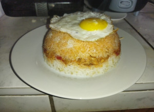 Una foto de Arroz tapado