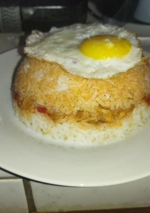 Una foto de Arroz tapado