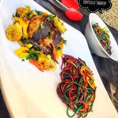 A picture of Rainbow 🌈 pasta vegetable fish sauce.