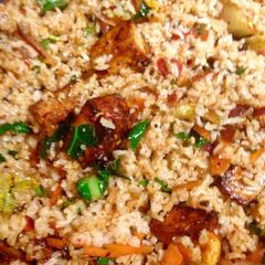 A picture of Fried vegetable brown basmati rice with marinated tofu.