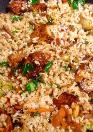 A picture of Fried vegetable brown basmati rice with marinated tofu.