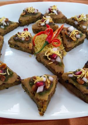 A picture of Healthy bites with dabeli topping.